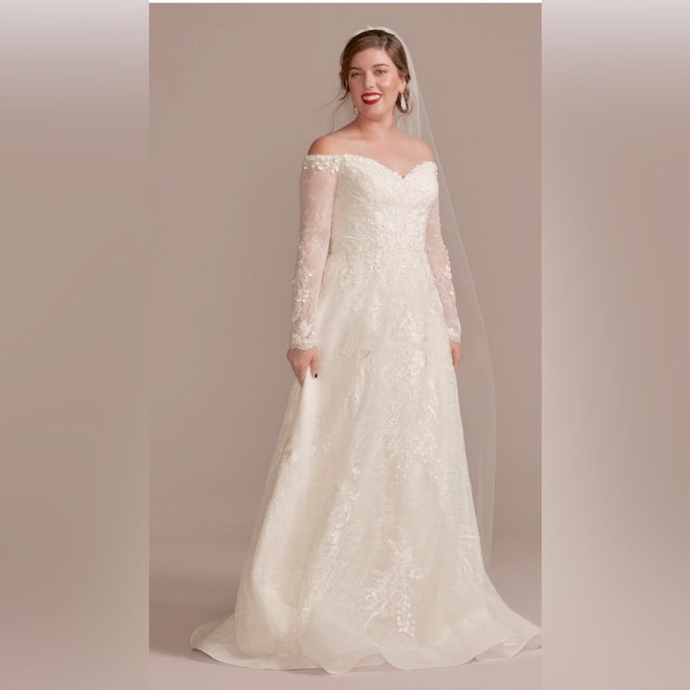OLEG CASSINI
leafy applique lace off the shoulder wedding dress

STYLE# CWG891